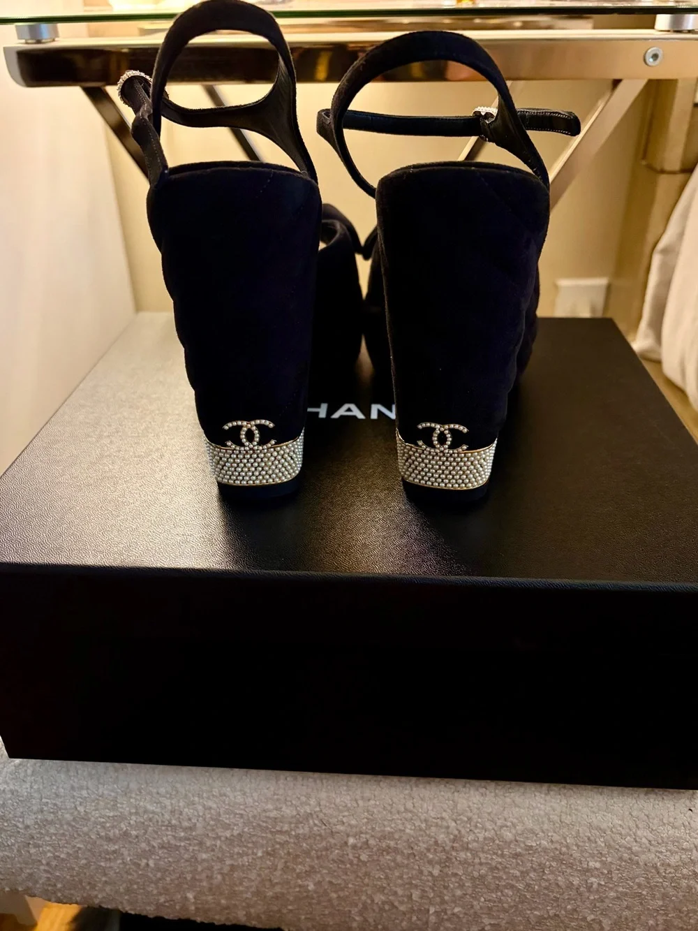 CHANEL Black Suede Platform Sandals with Bow and Pearl Heel Accent